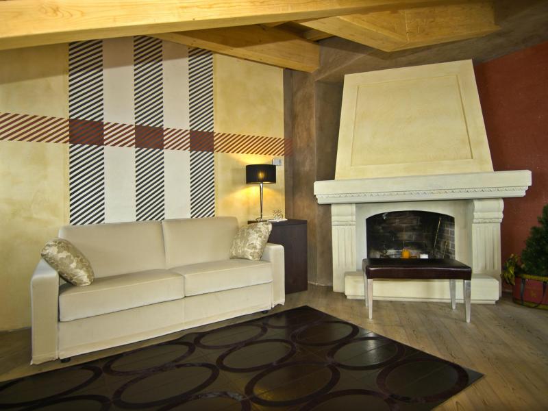 Hotel Concordia, Livigno, Wohnzimmer in Luxussuite
